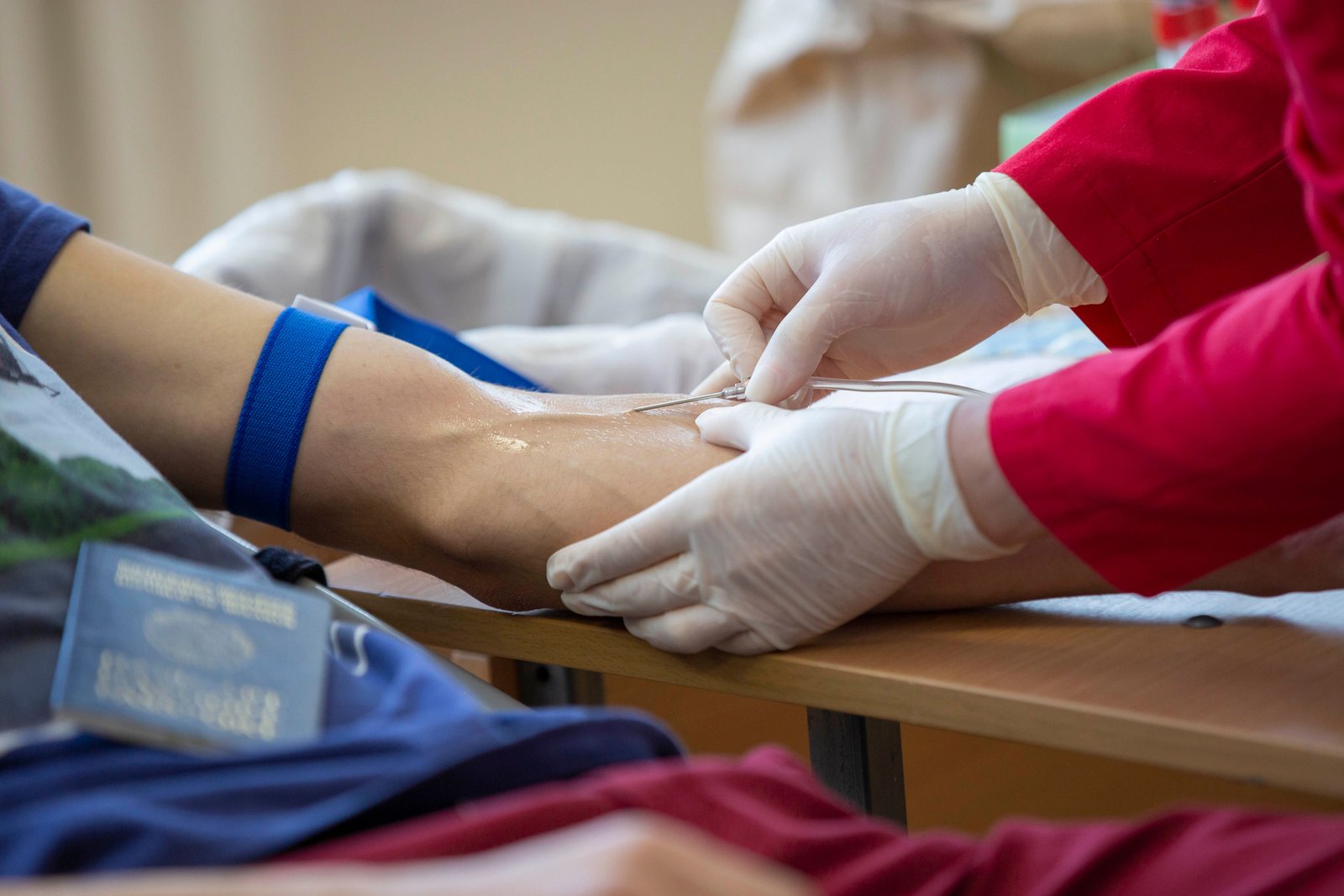 Blood donation in progress at a clinic